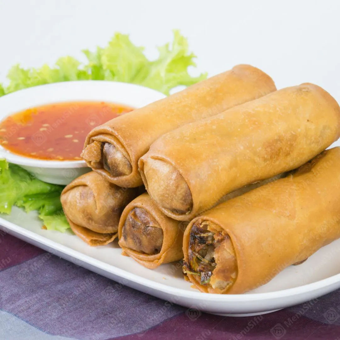 Crispy fried vegetable spring rolls with sweet chili dipping sauce at Bamboo Bowl Kitchen, a Chinese Restaurant in Moreno Valley