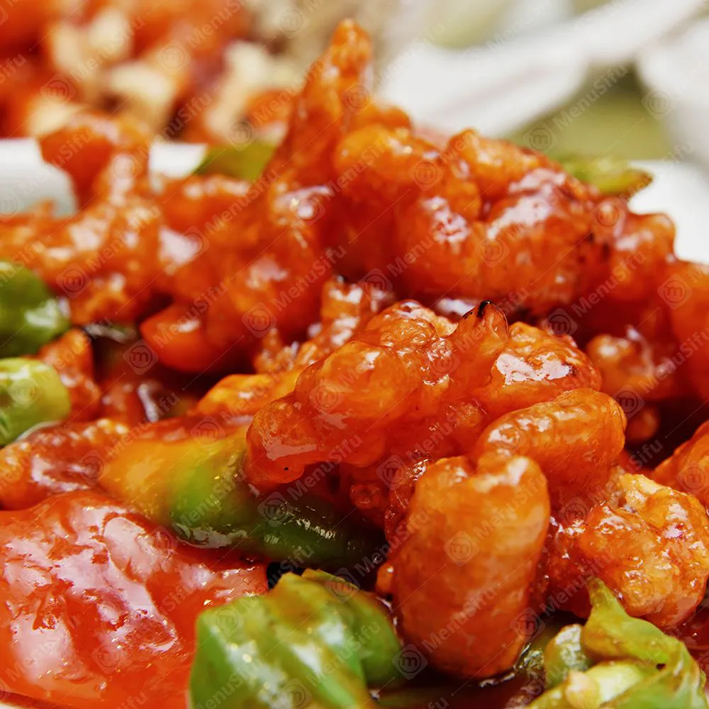 Sweet and sour crispy pork with fresh green bell pepper chunks at Bamboo Bowl Kitchen, a Chinese Restaurant in Moreno Valley